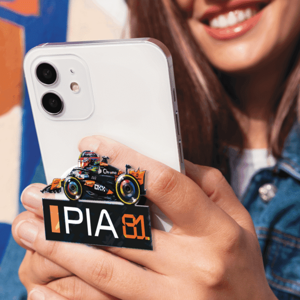 osacr 3 Showcase your racing passion with the Oscar Piastri Miniature F1 2025 Phone Grip. A stylish, functional, and collectible accessory for fans of Formula 1 and McLaren.