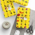 Context 1 Free Ferrari F1 gift wrap design featuring Charles Leclerc and Lewis Hamilton