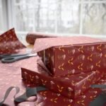 Context 4 Free Ferrari F1 gift wrap design featuring Charles Leclerc and Lewis Hamilton