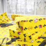 Context 4 Free Ferrari F1 gift wrap design featuring Charles Leclerc and Lewis Hamilton