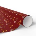 Rolled Free Ferrari F1 gift wrap design featuring Charles Leclerc and Lewis Hamilton