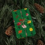 f12 Free Ferrari F1 gift wrap design featuring Charles Leclerc and Lewis Hamilton