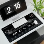 McLaren 2025 Constructors Championship desk mat with MCL39 car