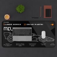 Minimalist black and white MCL40 monochrome technical desk mat featuring Lando Norris and Oscar Piastri schematics