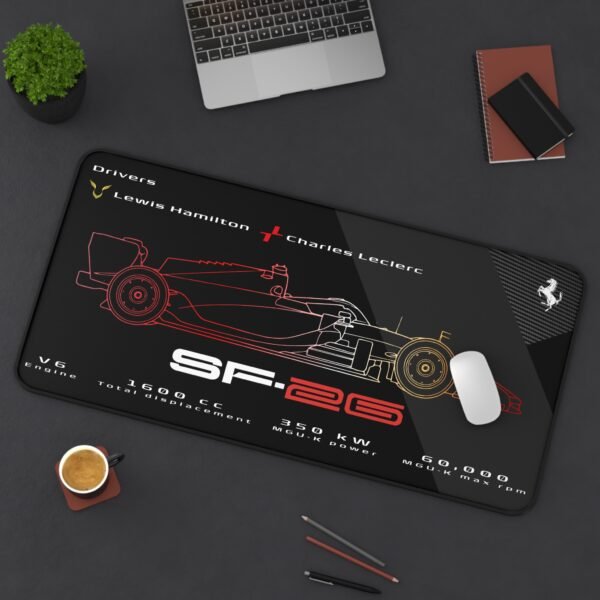 Context 2 (2) Black SF-26 technical spec desk mat with red and yellow gradient line art featuring Hamilton Leclerc and 1600 cc V6 engine data