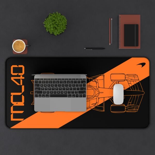 Context 1 (14) Stealth black MCL40 2026 F1 car blueprint desk mat with papaya orange lines