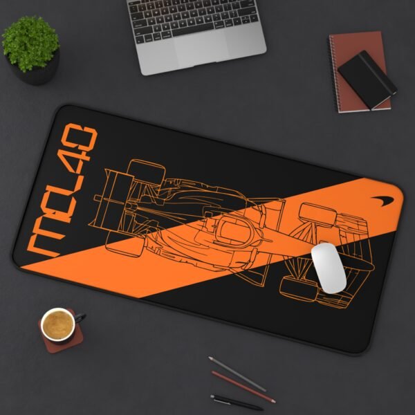 Context 2 (13) Stealth black MCL40 2026 F1 car blueprint desk mat with papaya orange lines