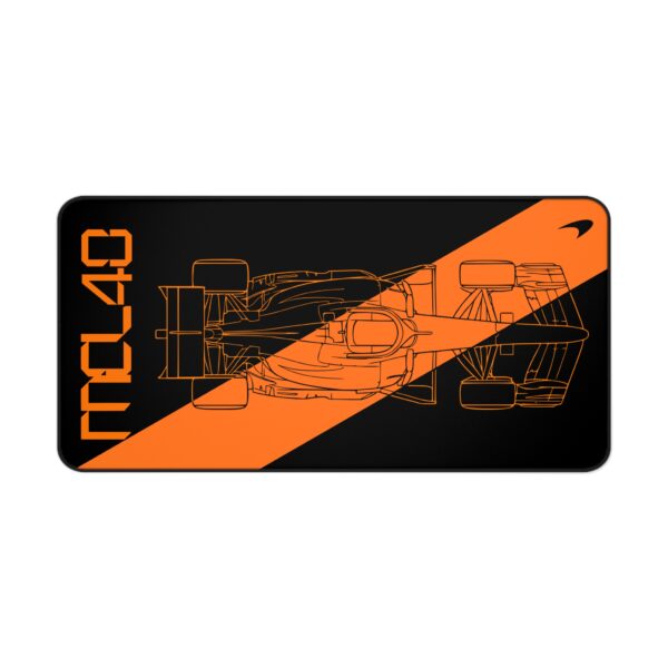 Stealth black MCL40 2026 F1 car blueprint desk mat with papaya orange lines