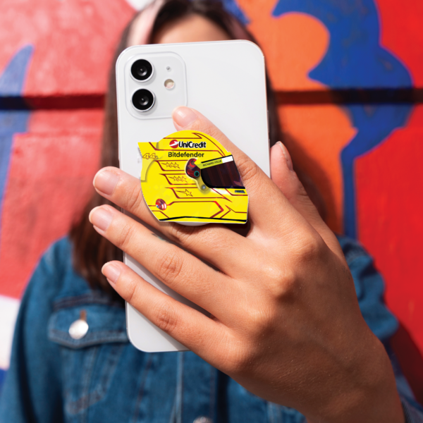 Mockup-Custom Shape Acrylic Phone Grip-Recovered-Recovered Lewis Hamilton's yellow helmet-shaped F1 phone grip held on the back of a phone