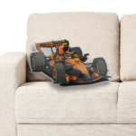 Oscar Piastri McLaren F1 car shaped plush pillow