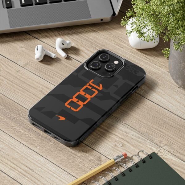 mclaren-f1-1000th-gp-inspired-phone-case-5.jpg McLaren Formula 1 Team - Lifestyle Shot 5